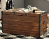 Luxury Living Gallery - Ashley Furniture - Kettleby Storage Trunk - Storage Trunk / Brown - A4000096