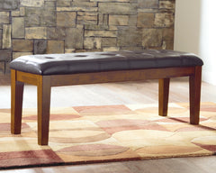 Luxury Living Gallery - Ashley Furniture - Ralene Dining Bench - Large UPH Dining Room Bench / Medium Brown / 50"W x 16"D x 19"H - D594-00
