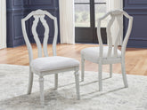 Luxury Living Gallery - Ashley Furniture - Montelaine Dining Room - Dining Chair (Set of 2) / Antique White - D795-01X2