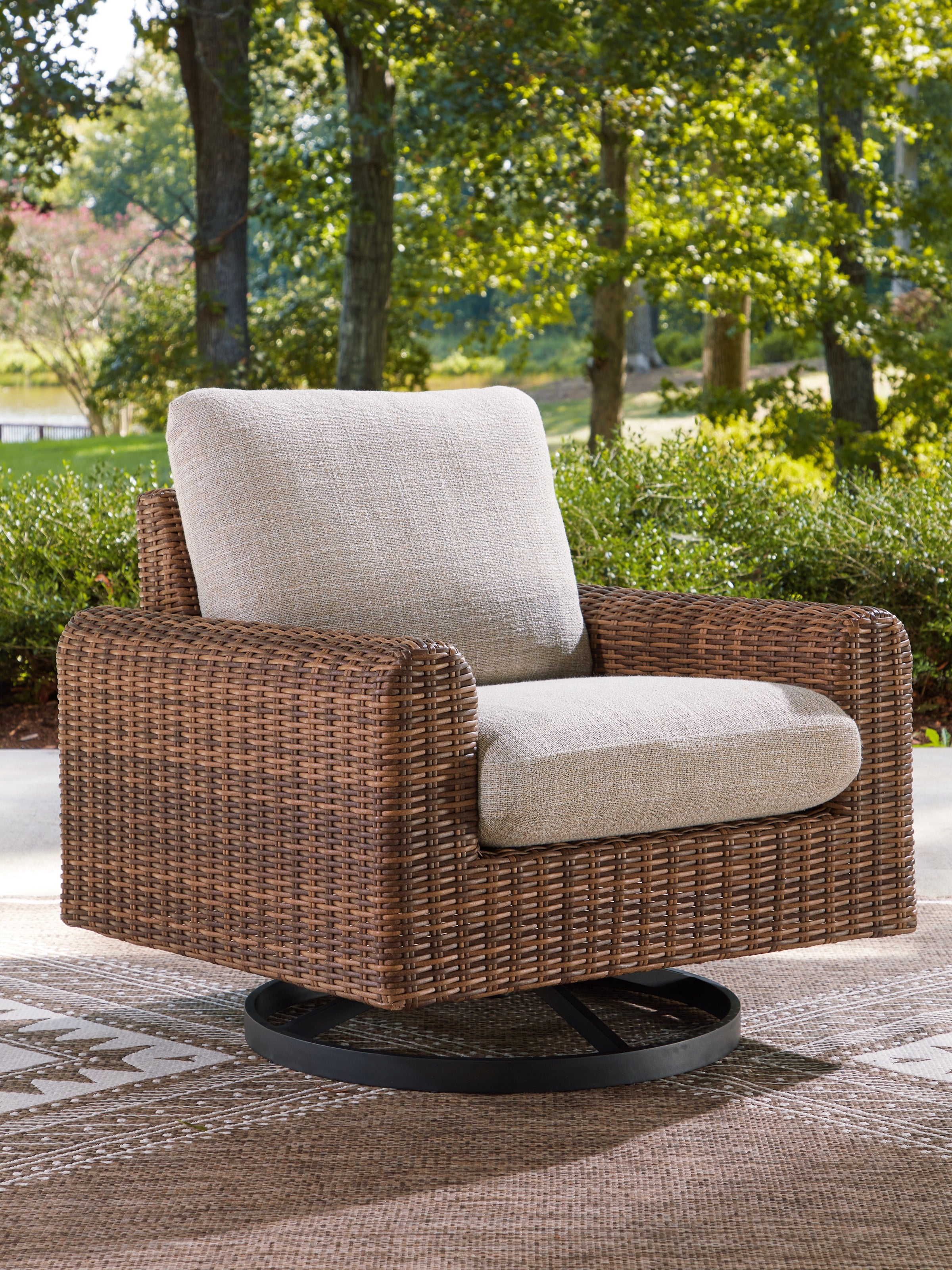 Luxury Living Gallery - Ashley Furniture - Dolan Creek Outdoor - Swivel Lounge w/ Cushion - PCP610-821