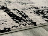 Luxury Living Gallery - Ashley Furniture - Zekeman Rug - 7'10" x 10' Rug / Black/Cream/Gray - R404921