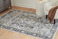 Luxury Living Gallery - Ashley Furniture - Gregmoore Rug - 7'9" x 9'11" Washable Rug / Multi - R405821