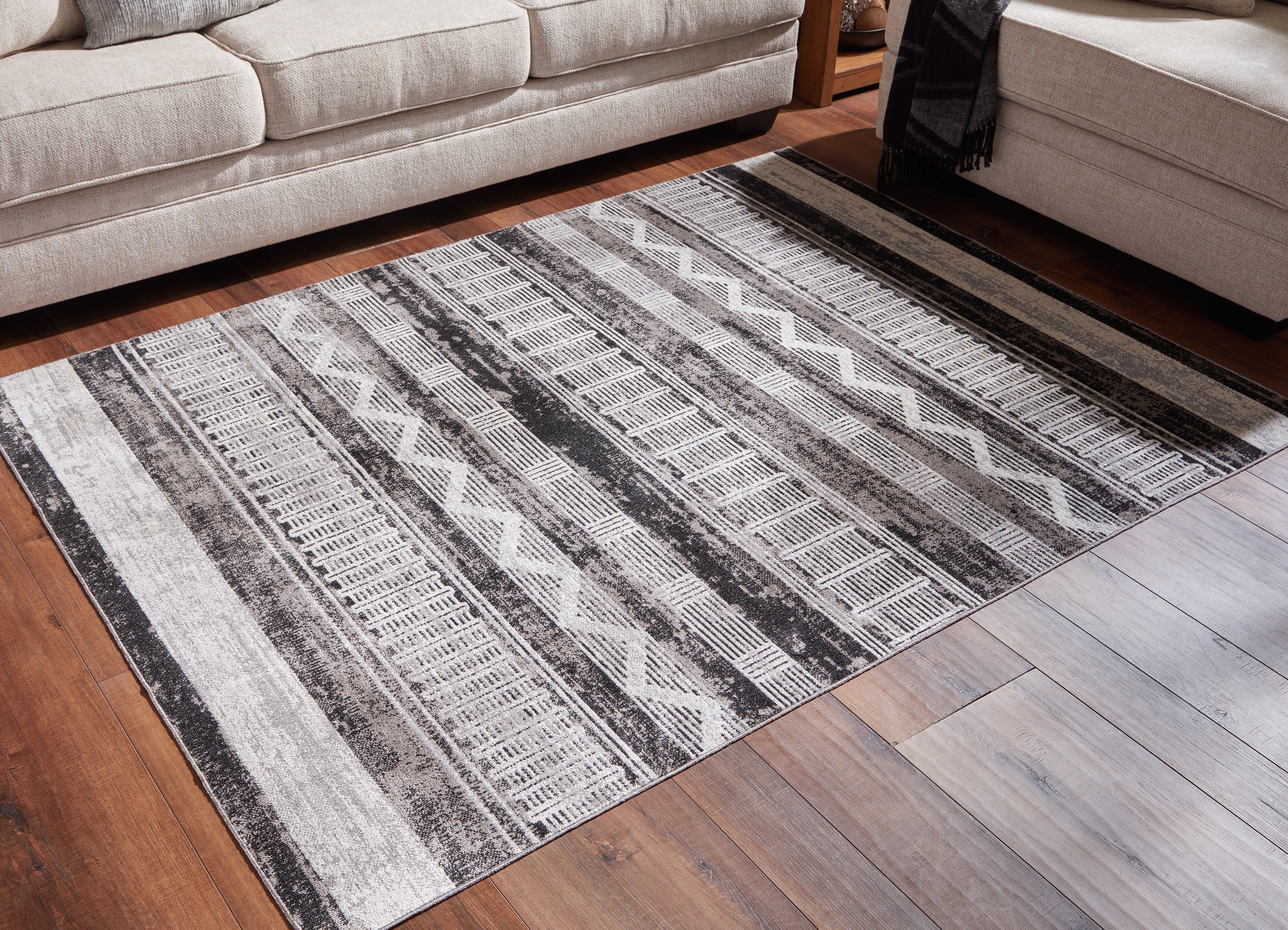 Luxury Living Gallery - Ashley Furniture - Henchester Rug - 5' x 7' Washable Rug / Multi - R405992