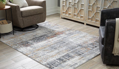 Luxury Living Gallery - Ashley Furniture - Rhettner Rug - 5'3" x 7'3" Rug / Multi - R406072