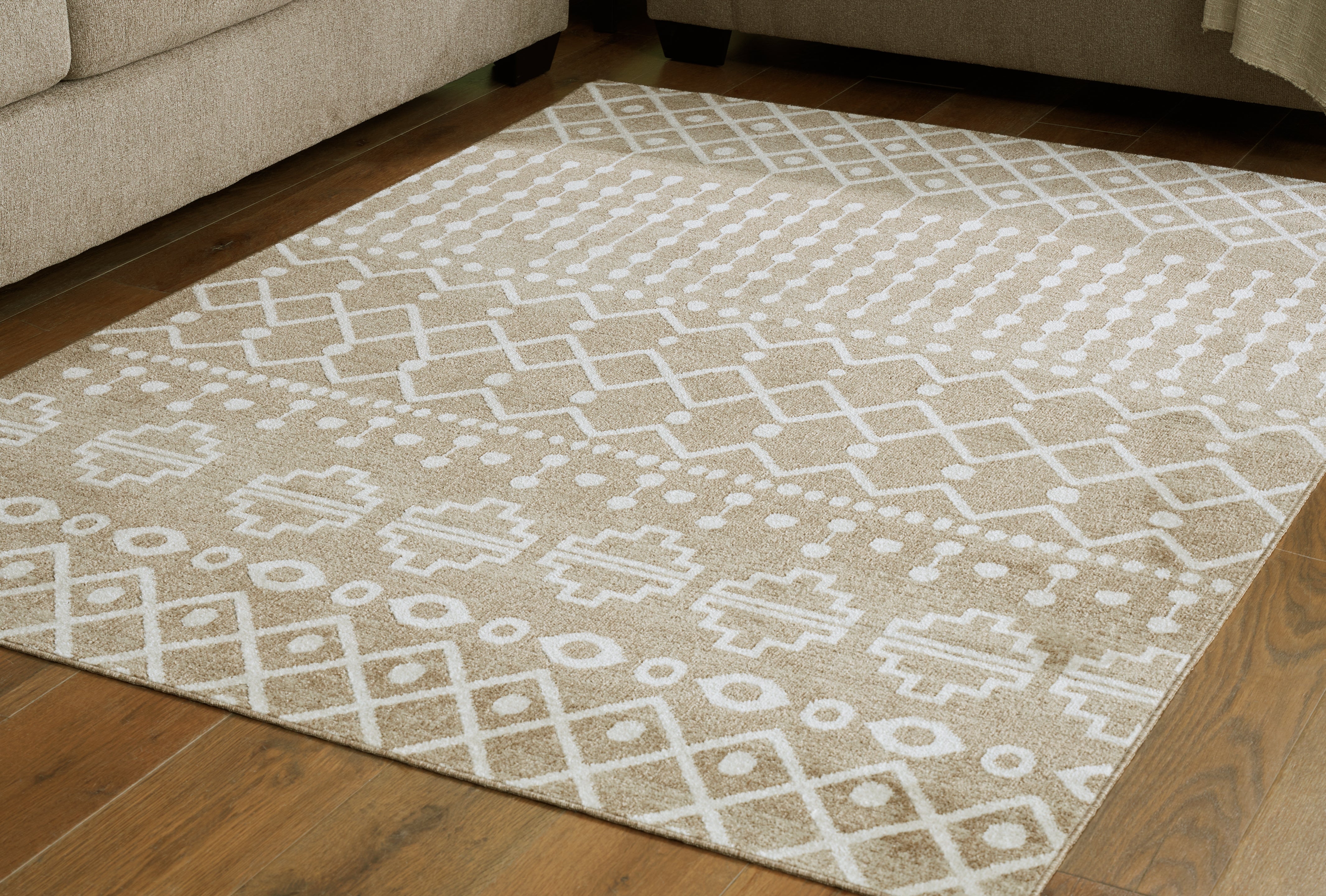 Luxury Living Gallery - Ashley Furniture - Bunchly Rug - 4'11" x 7'2" Washable Rug / Tan/Brown/Cream - R406222