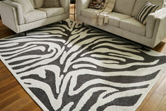 Luxury Living Gallery - Ashley Furniture - Thomwith Rug - 8' x 10'2" Washable Rug / Black/Ivory - R406291