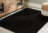 Luxury Living Gallery - Ashley Furniture - Anaben Rug - 5' x 7' Washable Rug / Black - R406312