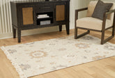 Luxury Living Gallery - Ashley Furniture - Calkin Rug - 8' x 10' Rug / Linen/Gray/Caramel - R406391