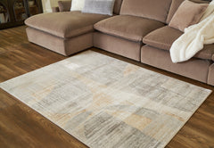 Luxury Living Gallery - Ashley Furniture - Truward Rug - 8' x 10' Rug / Linen/Gray/Caramel - R406471