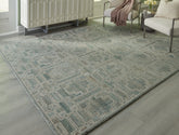 Luxury Living Gallery - Ashley Furniture - Jossland Rug - 5' x 7' Rug / Green/Ivory - R406912