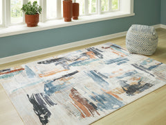Luxury Living Gallery - Ashley Furniture - Hessland Rug - 8' x 10' Washable Rug / Multi - R407051