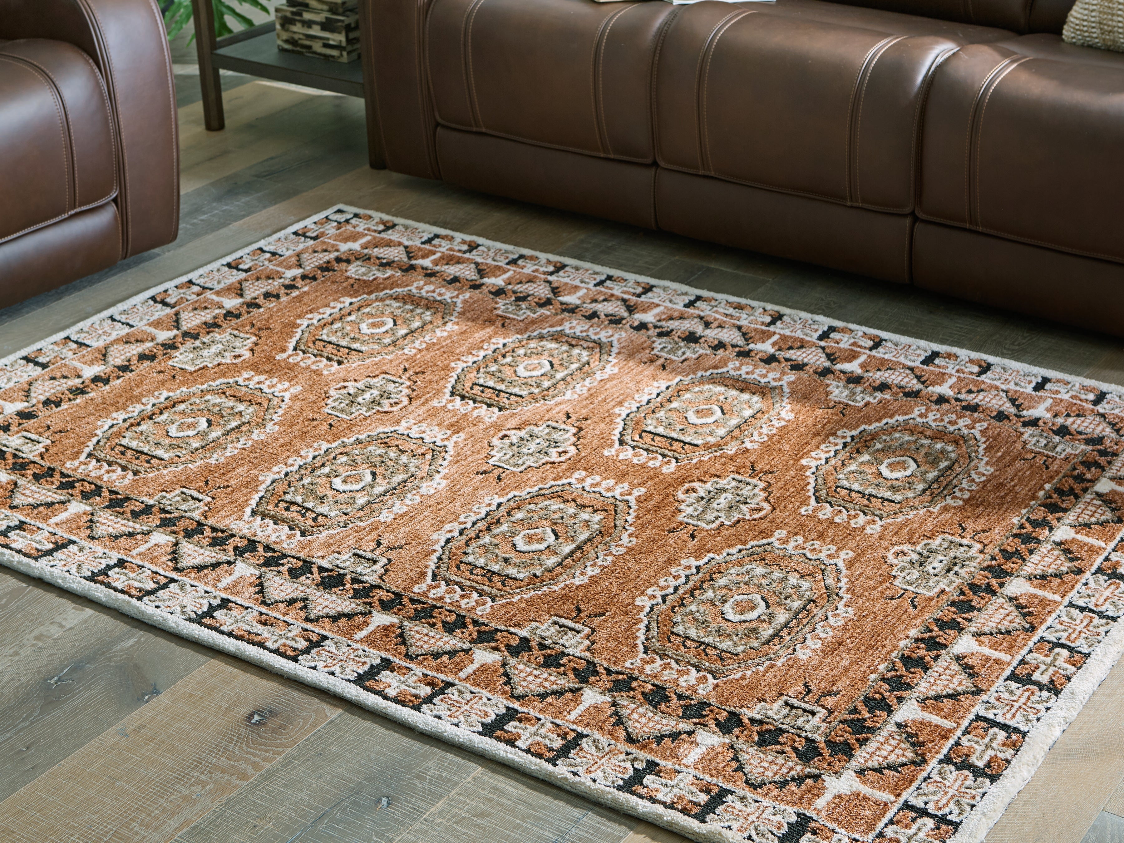 Luxury Living Gallery - Ashley Furniture - Qaabiz Rug - 5' x 7' Area Rug / Sienna/Ivory/Black - R407522