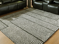 Luxury Living Gallery - Ashley Furniture - Kurtmen Rug - 7'10" x 9'10" Area Rug / Black/Ivory - R407591