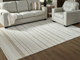 Luxury Living Gallery - Ashley Furniture - Gadence Rug - 7'8" x 10' Area Rug / Ivory/Tan - R407641