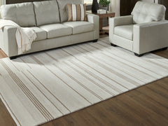 Luxury Living Gallery - Ashley Furniture - Gadence Rug - 7'8" x 10' Area Rug / Ivory/Tan - R407641