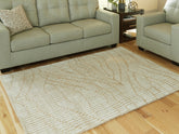 Luxury Living Gallery - Ashley Furniture - Jaseena Rug - 7'8" x 10' Area Rug / Beige/Tan - R407721