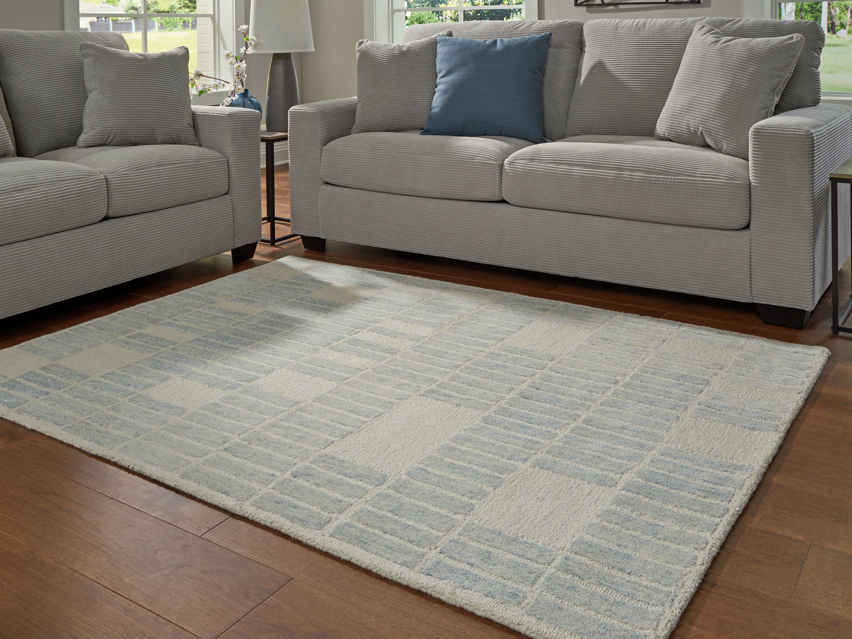 Luxury Living Gallery - Ashley Furniture - Dylanton Rug - 7'8" x 10' Area Rug / Ivory/Blue - R407811