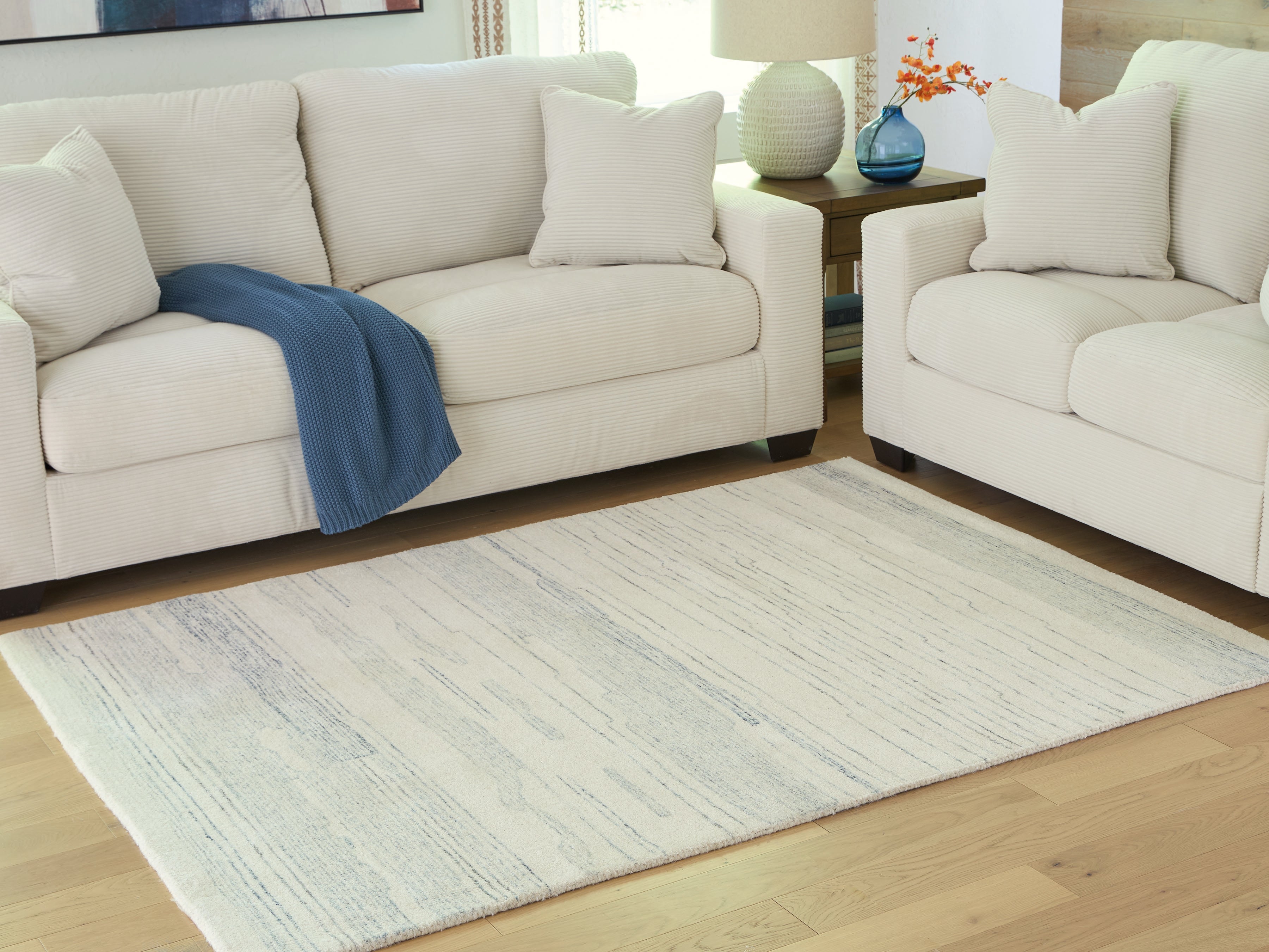 Luxury Living Gallery - Ashley Furniture - Genemost Rug - 7'8" x 10' Area Rug / Ivory/Blue - R407841