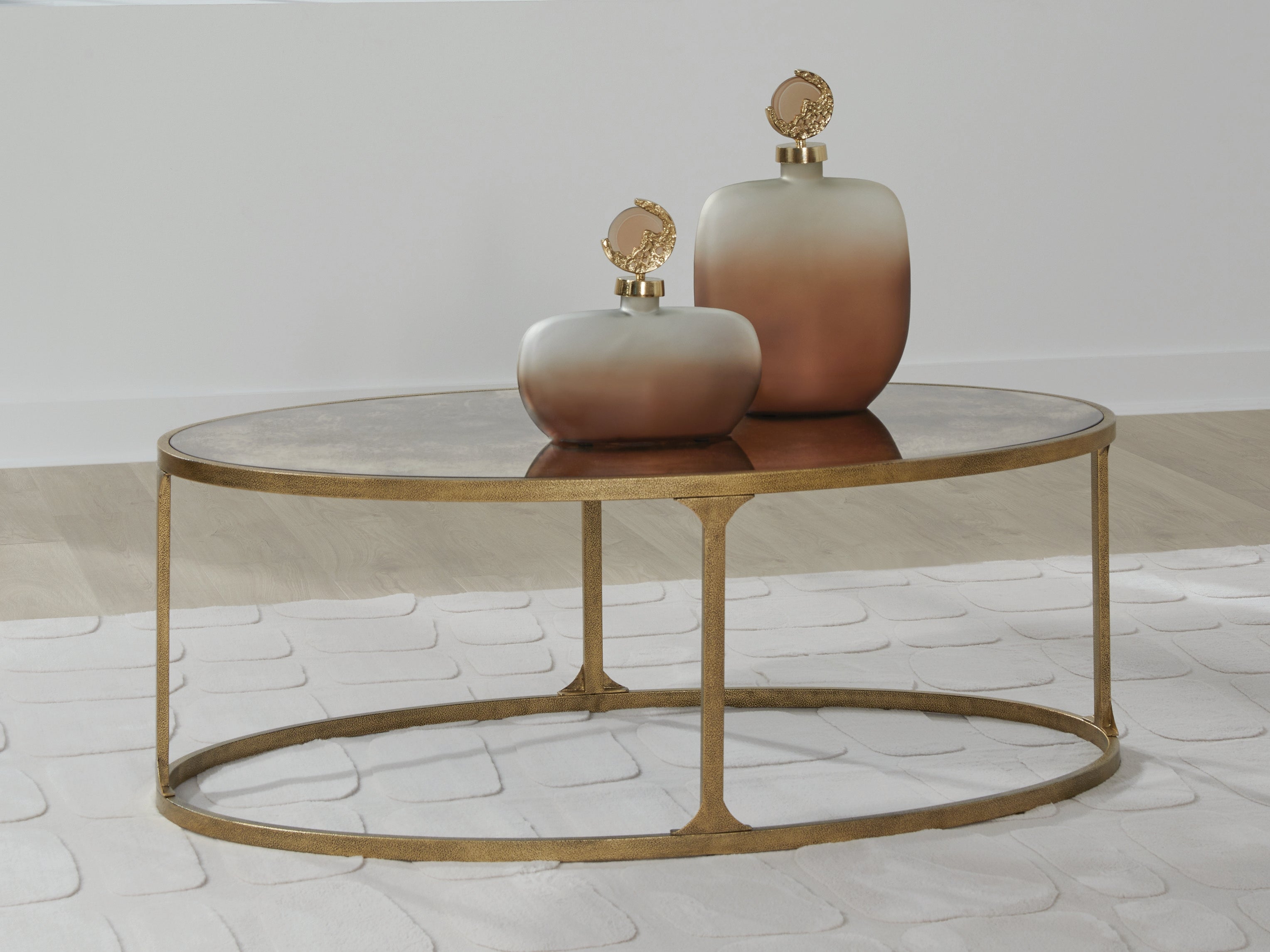 Luxury Living Gallery - Ashley Furniture - Korajane Coffee Table - Oval Cocktail Table / Antique Gold - T399-0