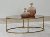 Luxury Living Gallery - Ashley Furniture - Korajane Coffee Table - Oval Cocktail Table / Antique Gold - T399-0