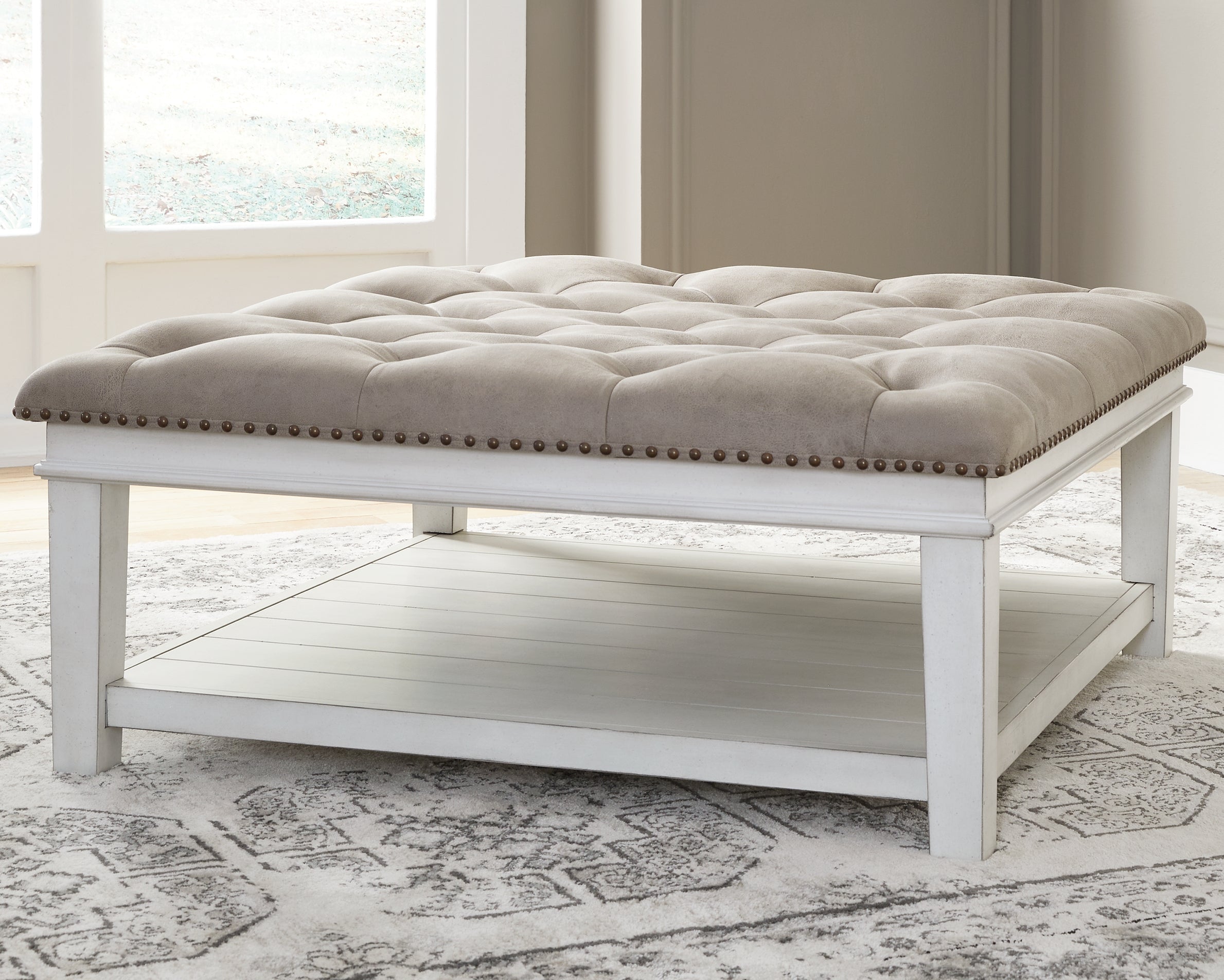 Luxury Living Gallery - Ashley Furniture - Kanwyn Upholstered Ottoman Coffee Table - UPH Ottoman Cocktail Table / Whitewash - T937-21