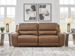 Luxury Living Gallery - Ashley Furniture - DeepWakes Living Room - 2 Seat PWR REC Sofa ADJ HDREST / Caramel - PCU6260647
