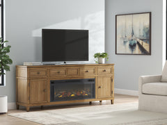 Luxury Living Gallery - Ashley Furniture - Sharlance 81" TV Stand with Electric Fireplace - 81" TV Stand with Electric Fireplace / Light Brown - W655W1