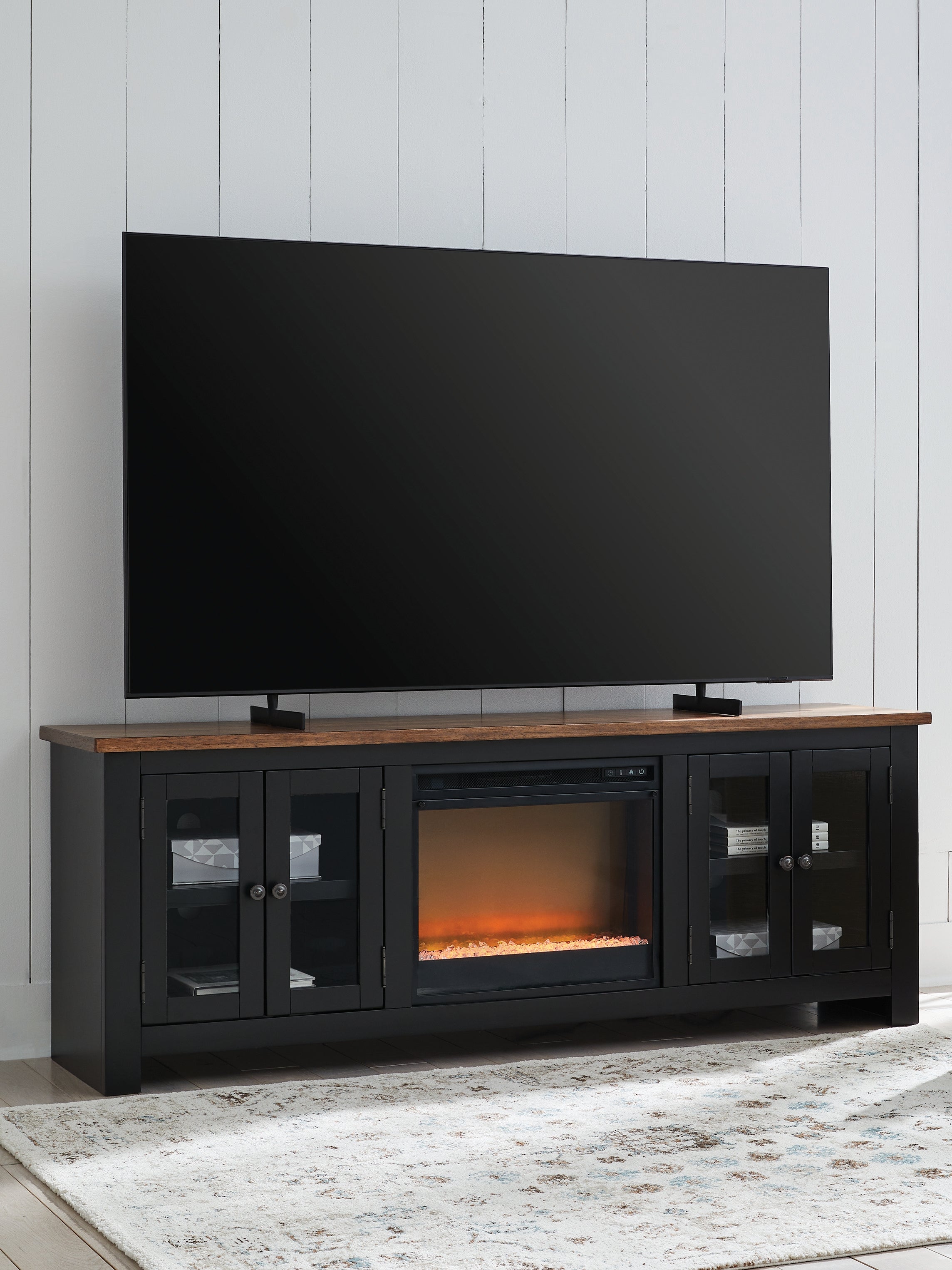 Luxury Living Gallery - Ashley Furniture - Wildenauer 76" TV Stand with Electric Fireplace - 76" TV Stand with Electric Fireplace / Brown/Black - W664W2