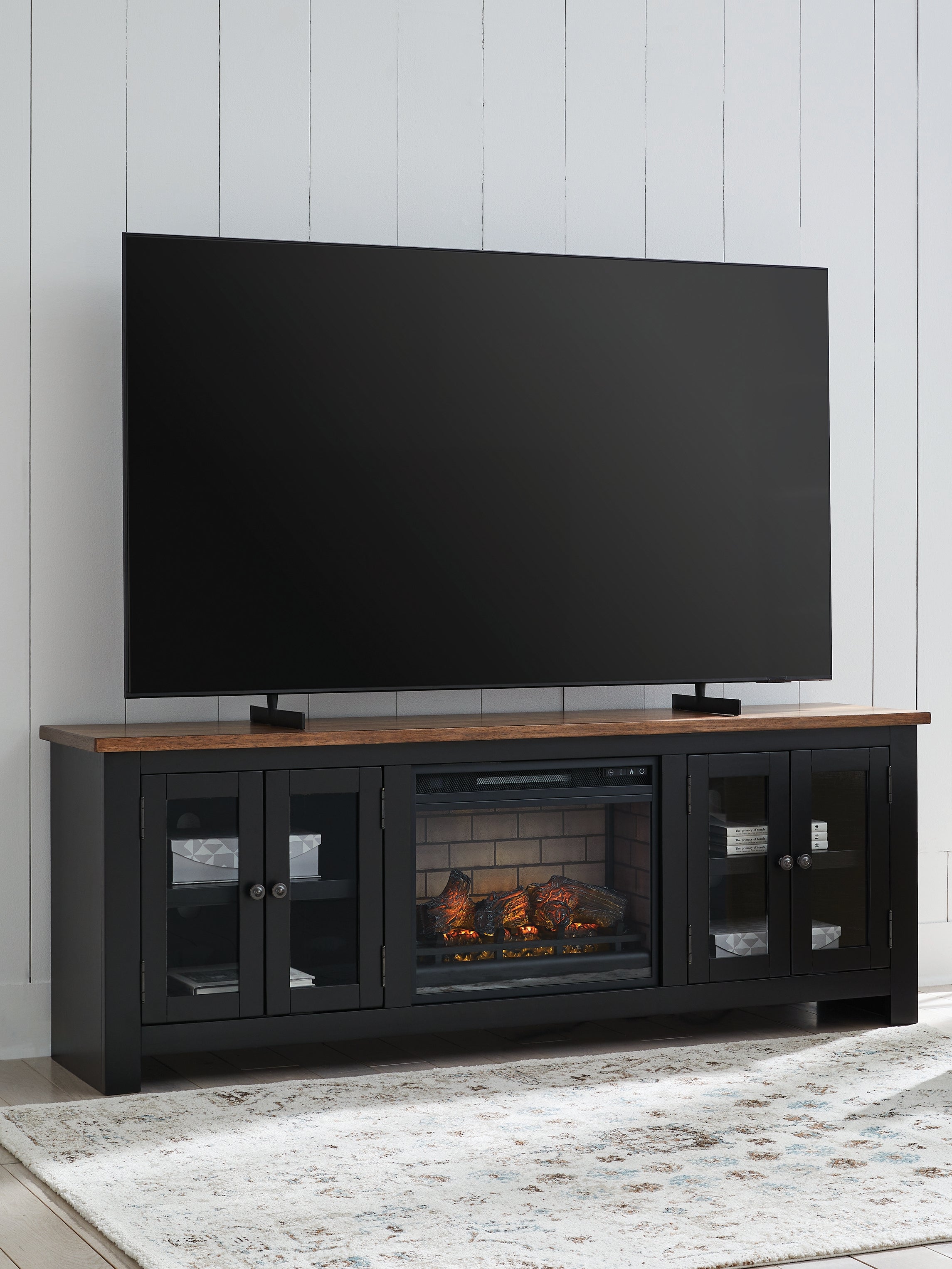 Luxury Living Gallery - Ashley Furniture - Wildenauer 76" TV Stand with Electric Fireplace - 76" TV Stand with Electric Fireplace / Brown/Black - W664W1