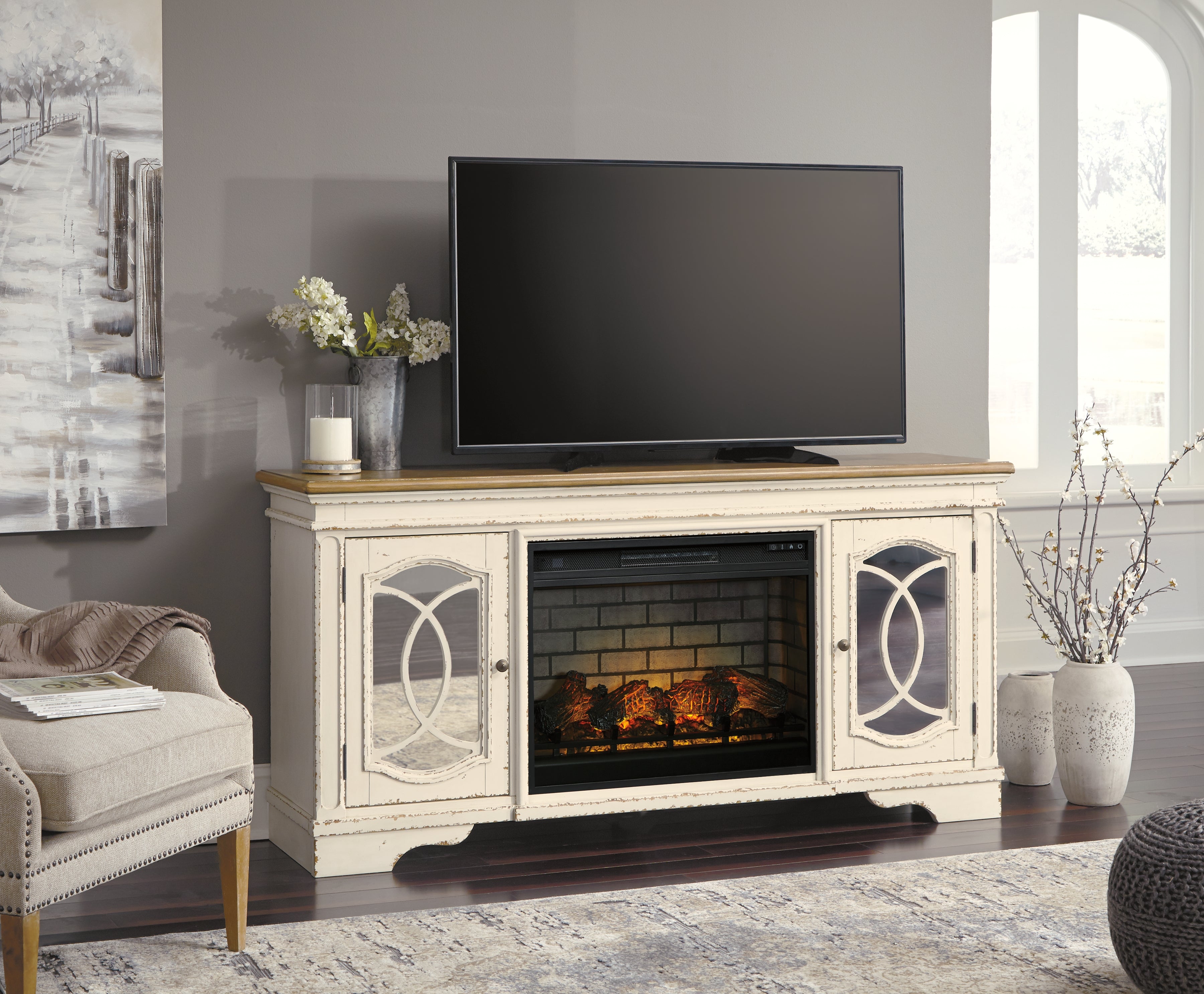 Luxury Living Gallery - Ashley Furniture - Realyn 74" TV Stand with Electric Fireplace - 74" TV Stand with Electric Fireplace / Chipped White - W743W2