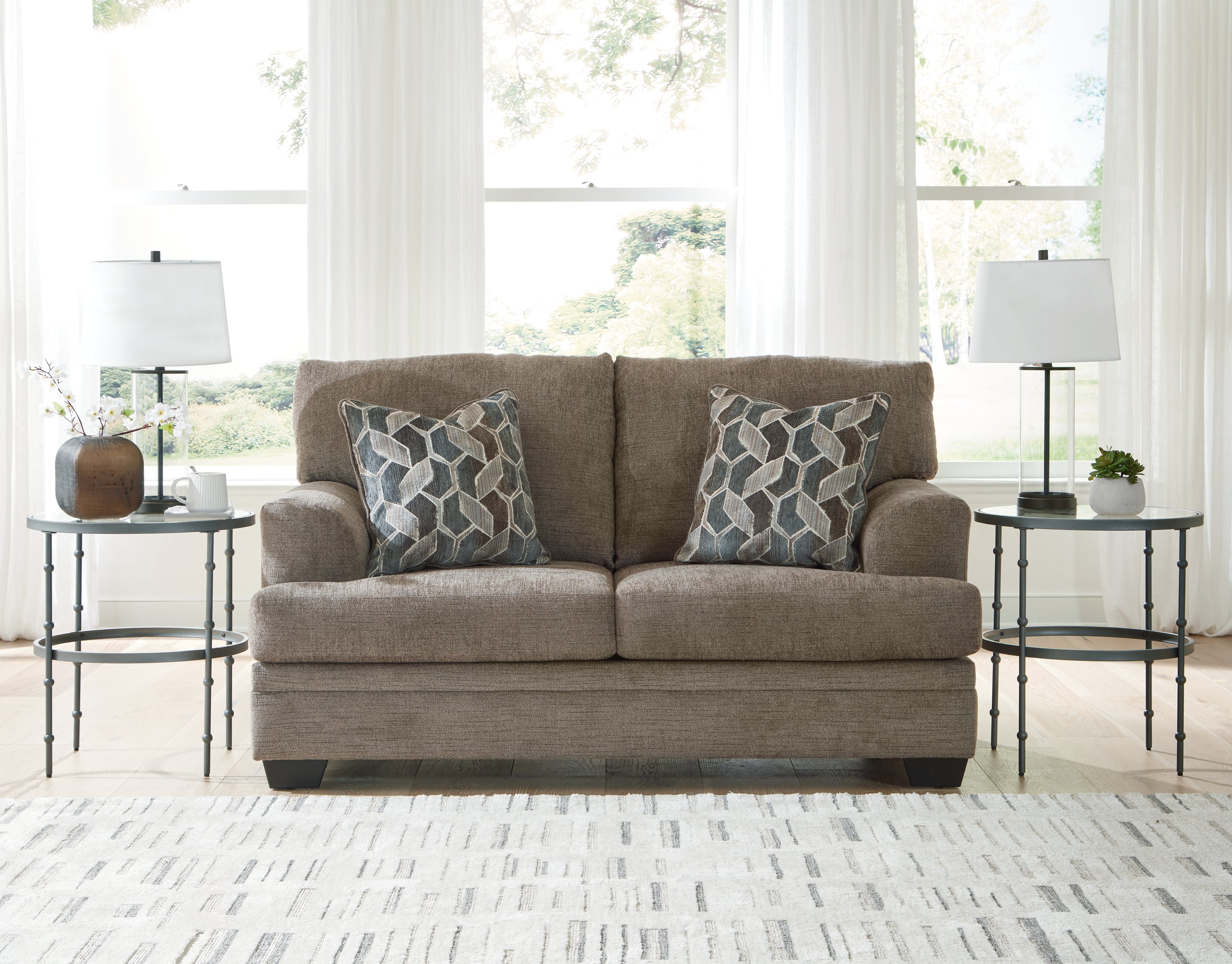 Luxury Living Gallery - Ashley Furniture - Stonemeade Living Room - Loveseat / Nutmeg - 5950535