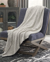 Luxury Living Gallery - Ashley Furniture - Leonita Throw - Throw / Black/White - A1000769T