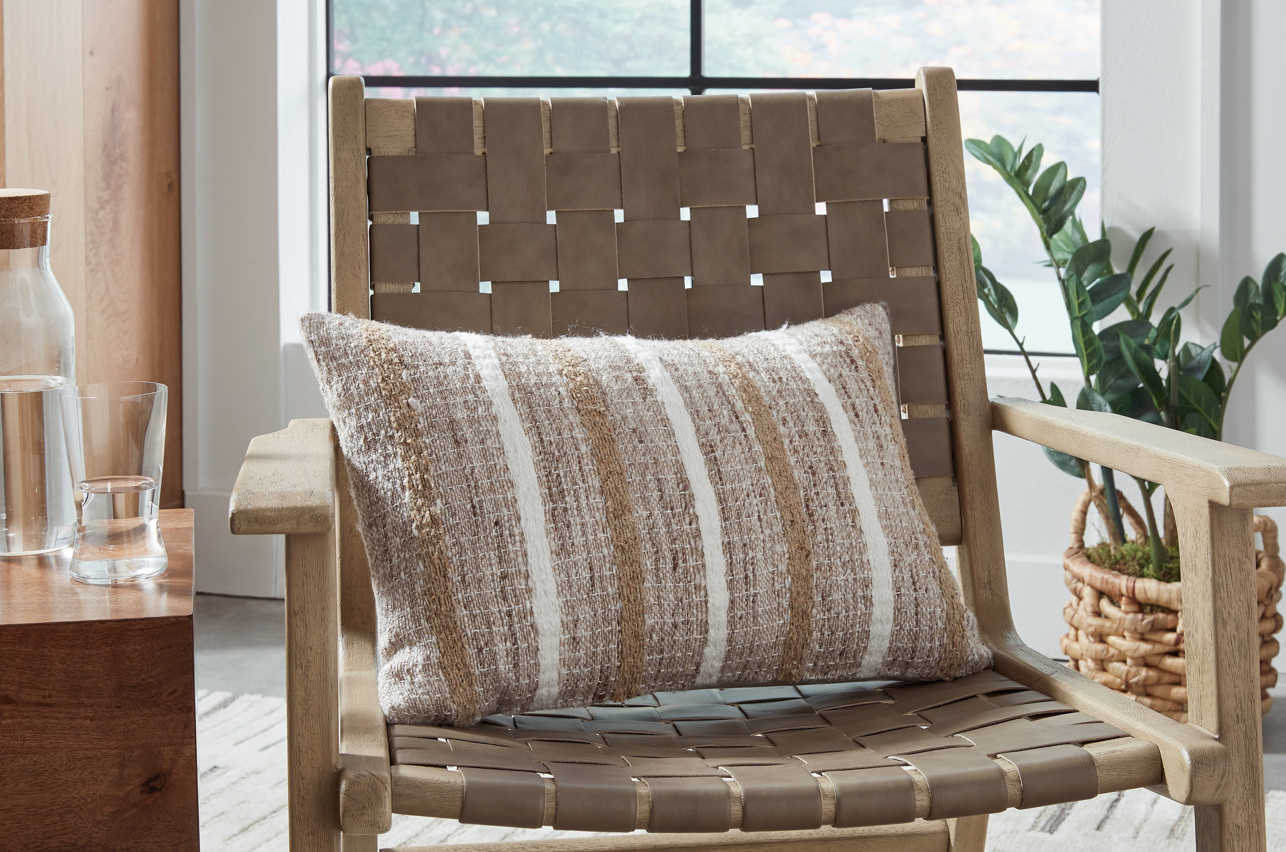 Luxury Living Gallery - Ashley Furniture - Benish Pillows - Pillow / Tan/Brown/White - A1001047P