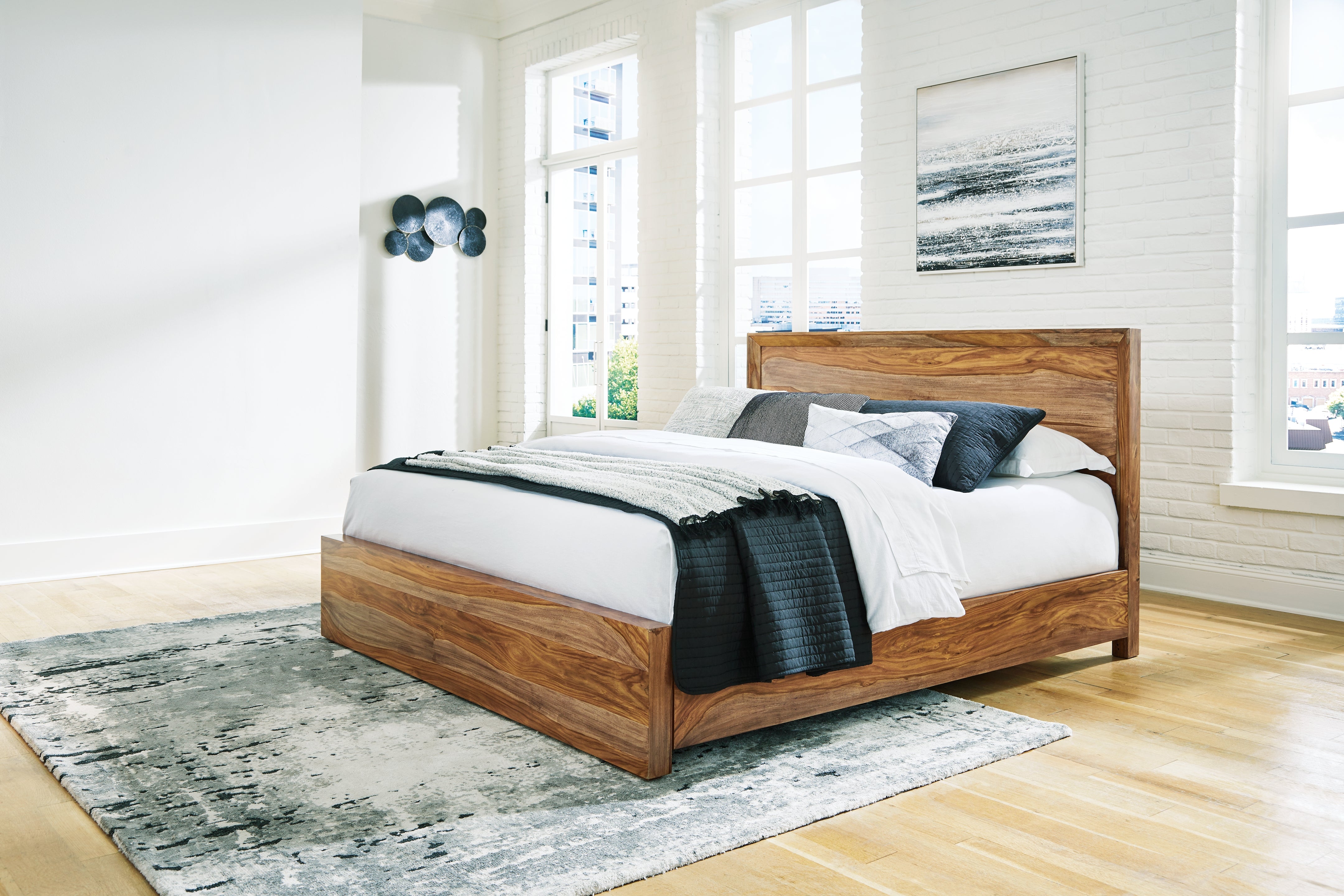 Luxury Living Gallery - Ashley Furniture - Dressonni Bedroom - King Panel Bed / Brown - B790B4