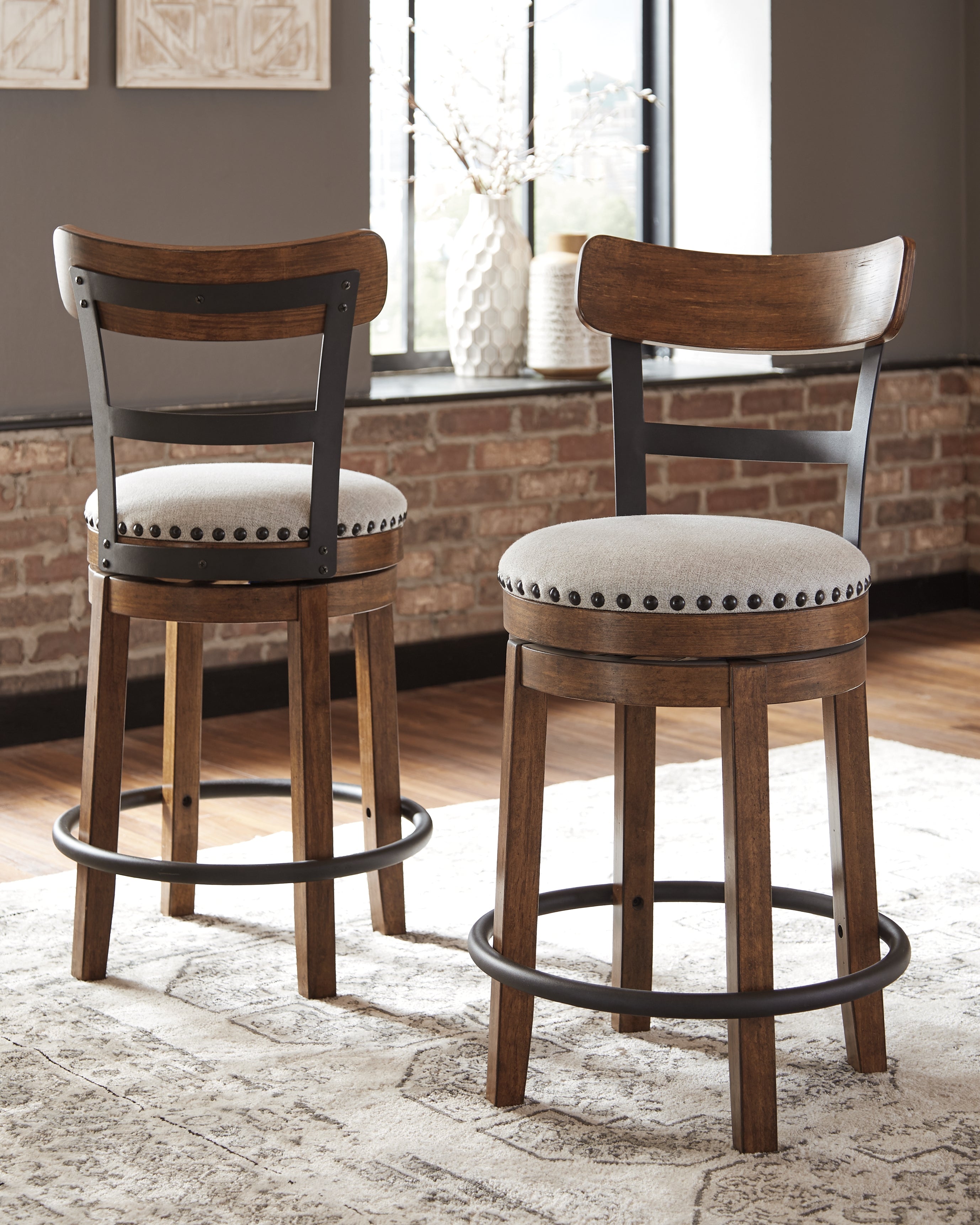 Luxury Living Gallery - Ashley Furniture - Valebeck Dining Room - UPH Swivel Barstool (1/CN) / Brown - D546-424