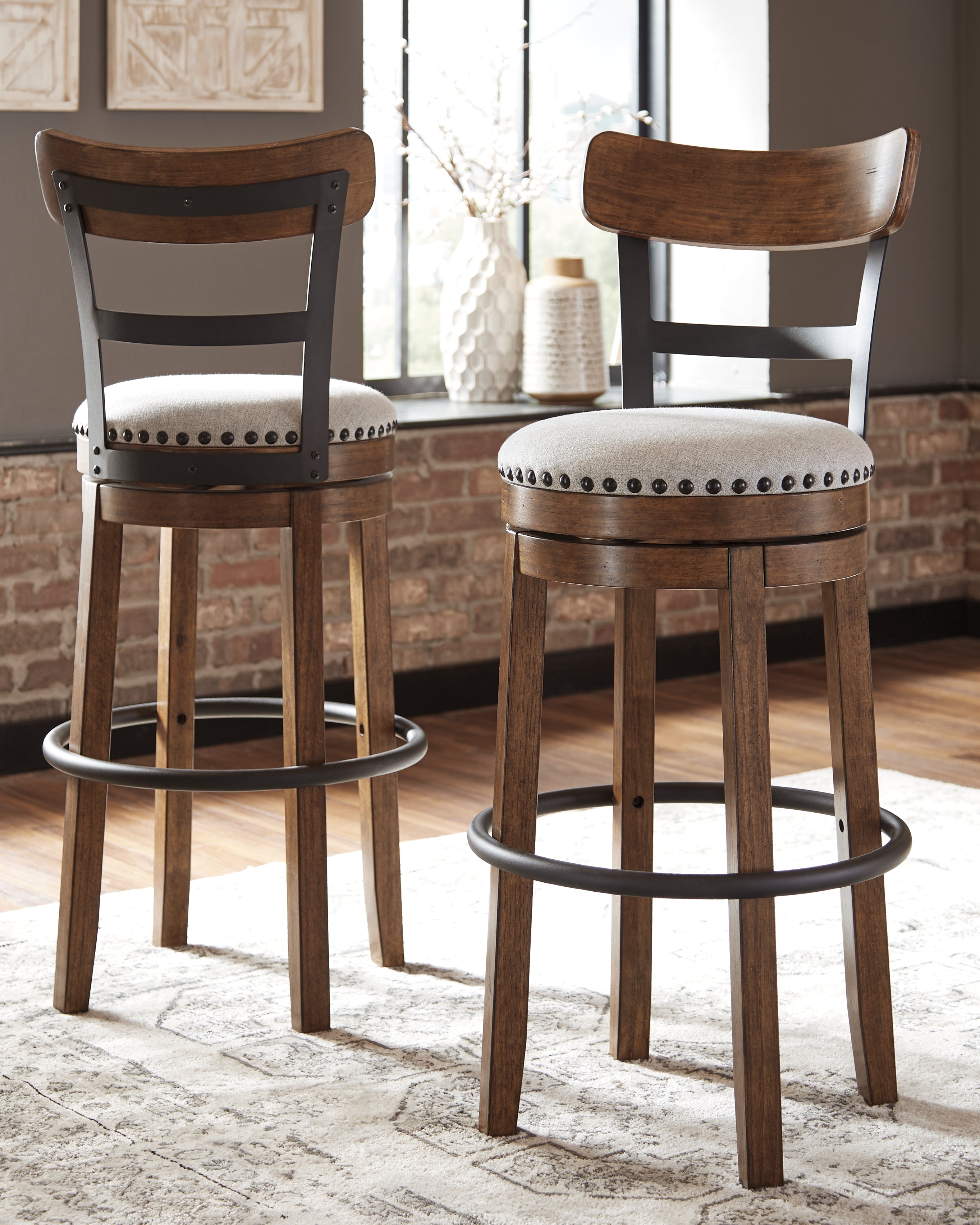 Luxury Living Gallery - Ashley Furniture - Valebeck Dining Room - Tall UPH Swivel Barstool(1/CN) / Brown - D546-430