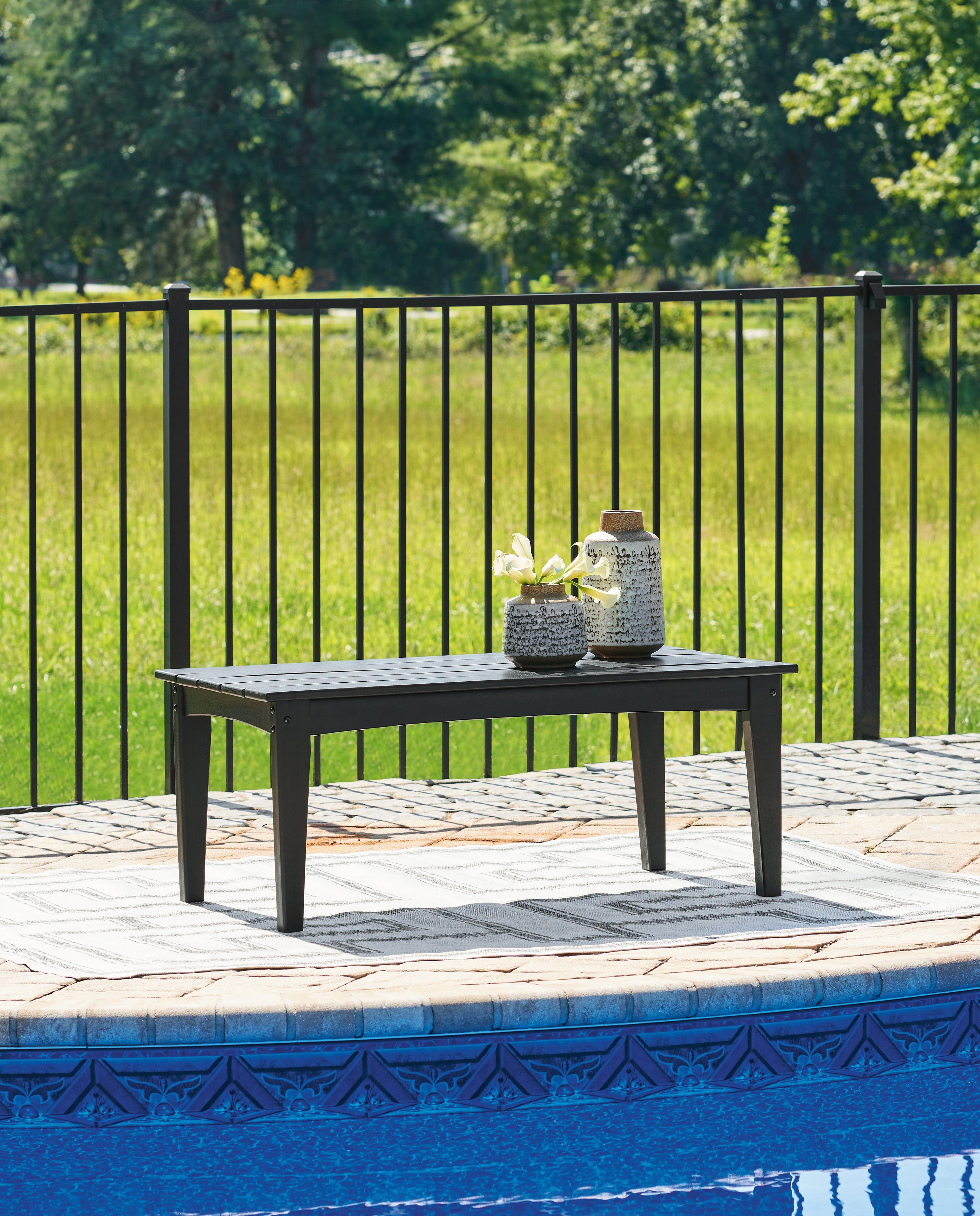 Luxury Living Gallery - Ashley Furniture - Hyland wave Outdoor - Rectangular Cocktail Table / Black - P108-701
