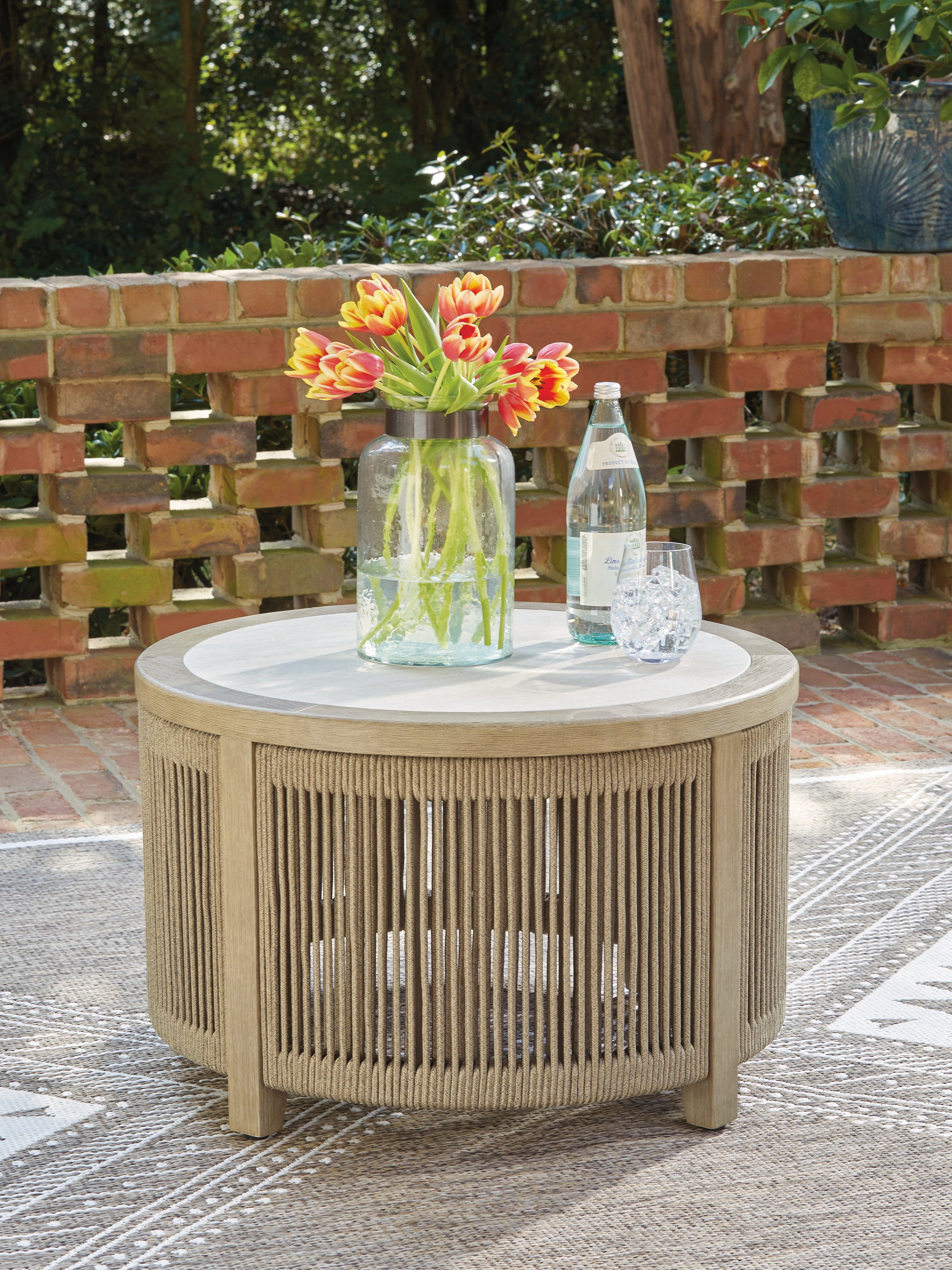 Luxury Living Gallery - Ashley Furniture - Spooners Cove Outdoor - Round Cocktail Table / Beige - PCP469-708