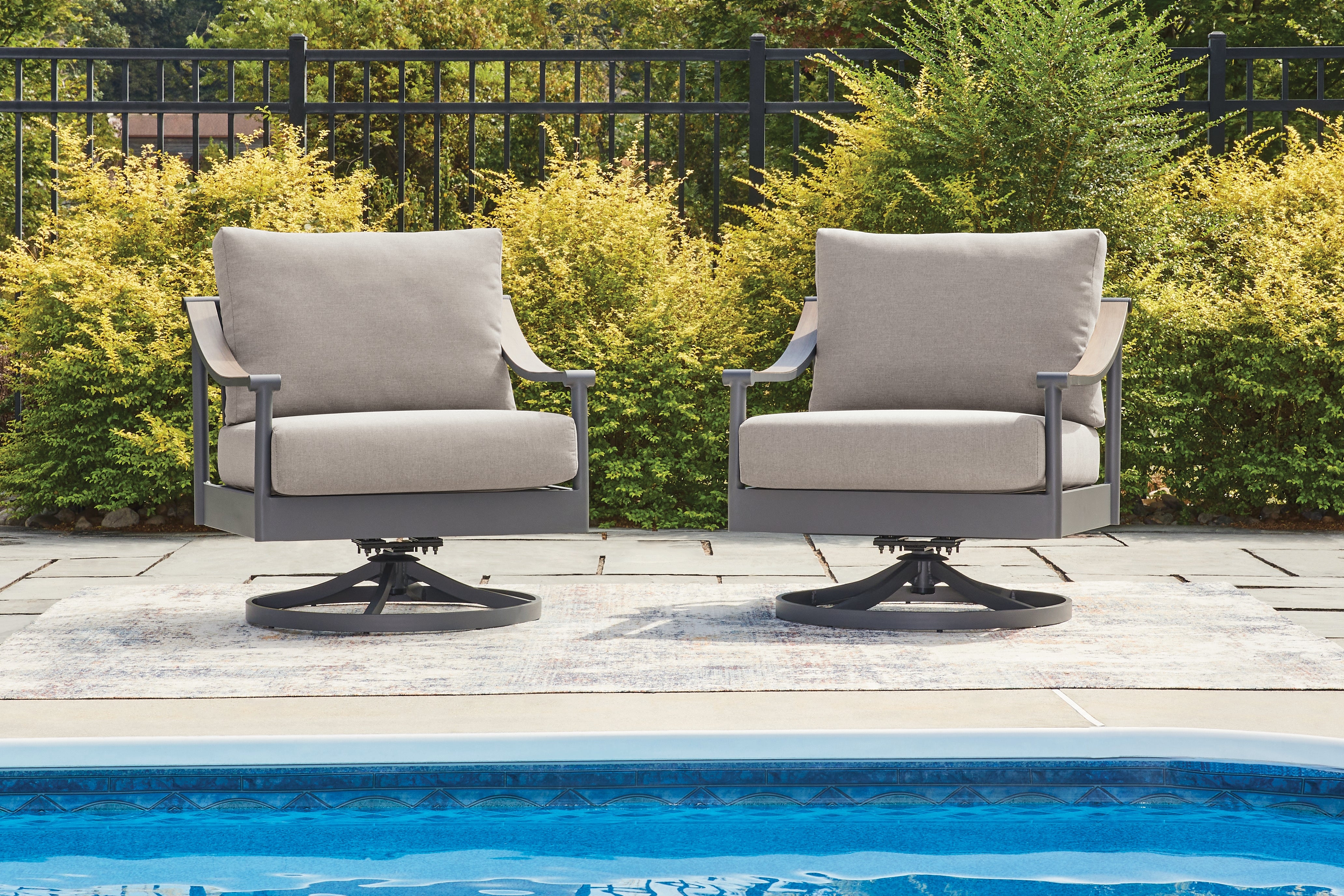 Luxury Living Gallery - Ashley Furniture - Ocean Beach Outdoor - Swivel Lounge w/ Cushion / Gray - PCP510-821