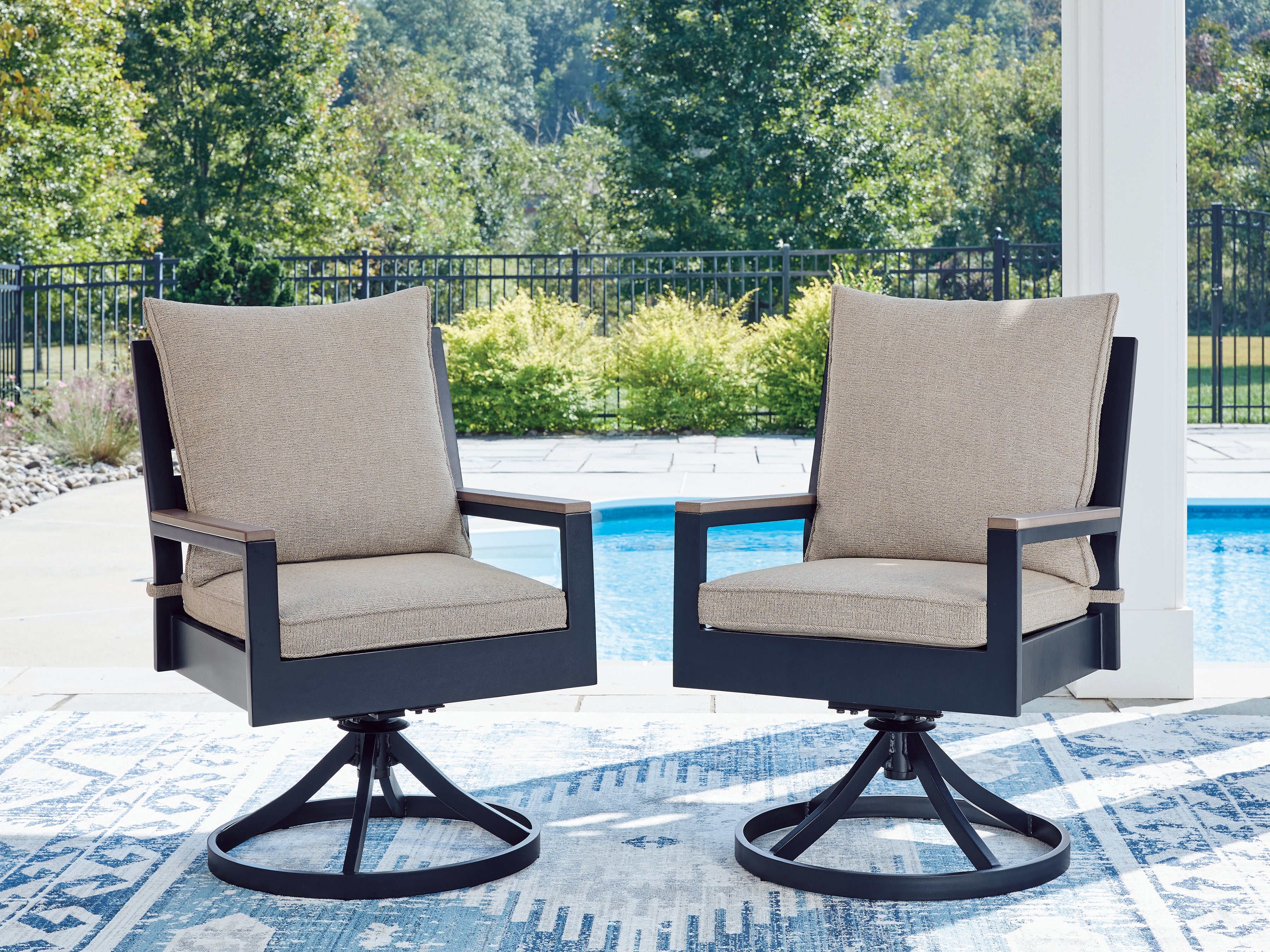 Luxury Living Gallery - Ashley Furniture - East Beach Outdoor - Swivel Chair w/Cushion (Set of 2) / Navy Blue/Driftwood - PCP587-602A
