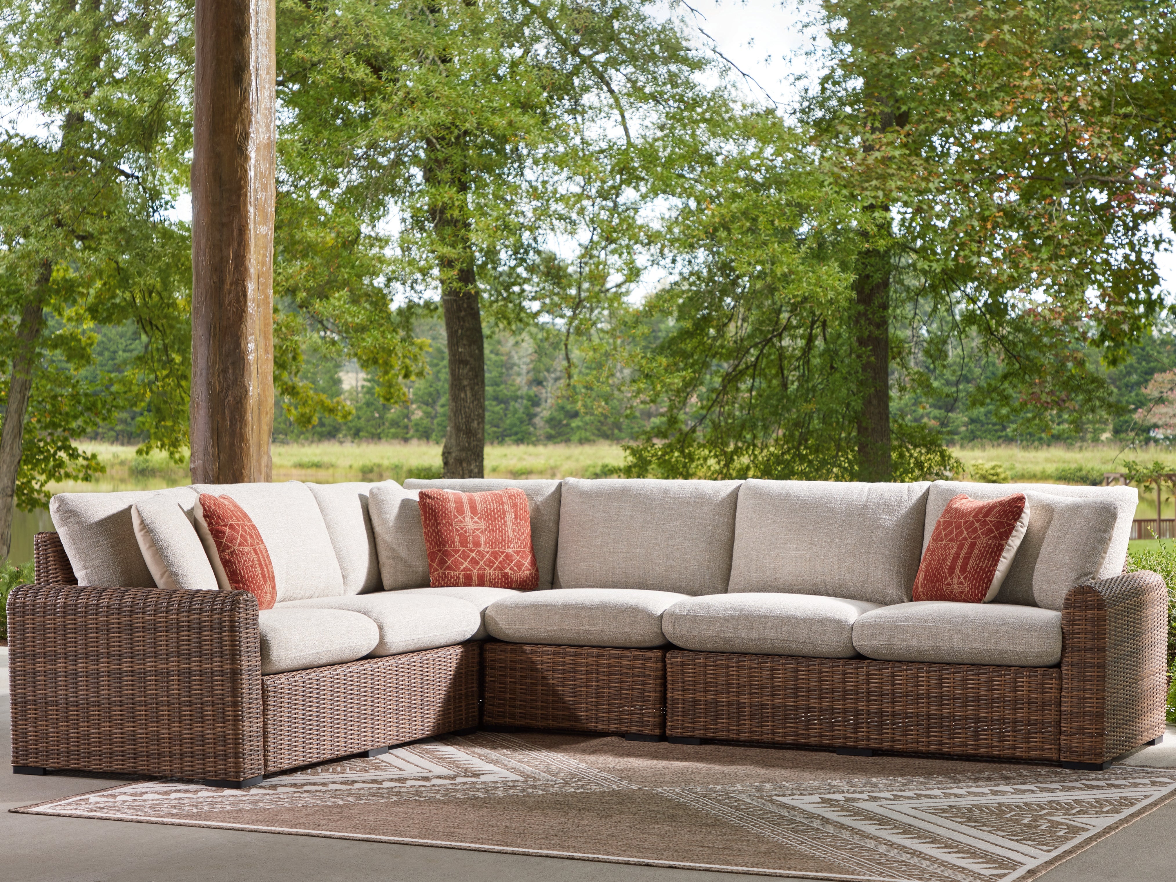 Luxury Living Gallery - Ashley Furniture - Dolan Creek Outdoor - 4-Piece Outdoor Sectional / Beige/Brown - PCP610P2
