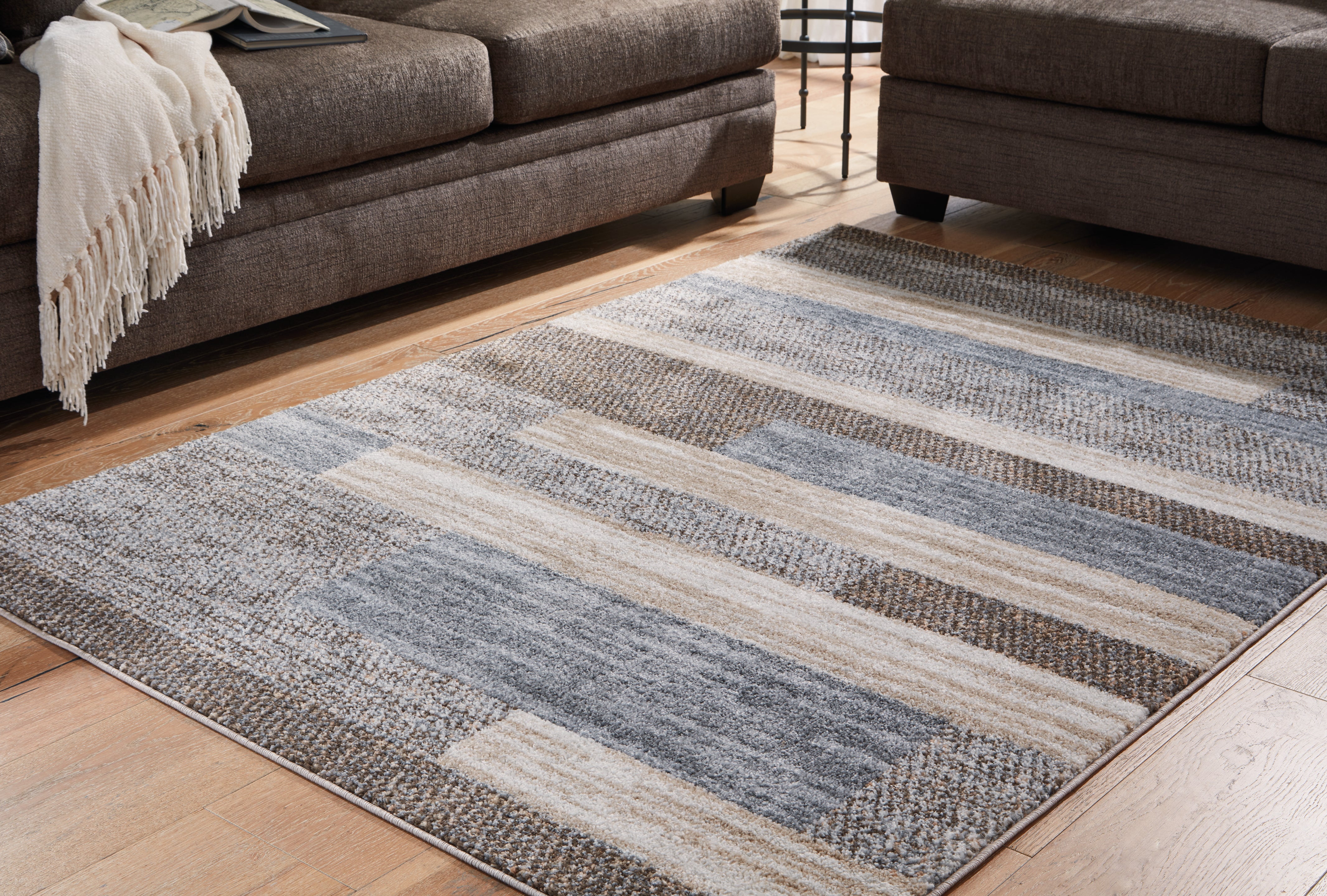 Luxury Living Gallery - Ashley Furniture - Sethburn Rug - 8' x 10' Rug / Cream/Brown/Gray - R406591