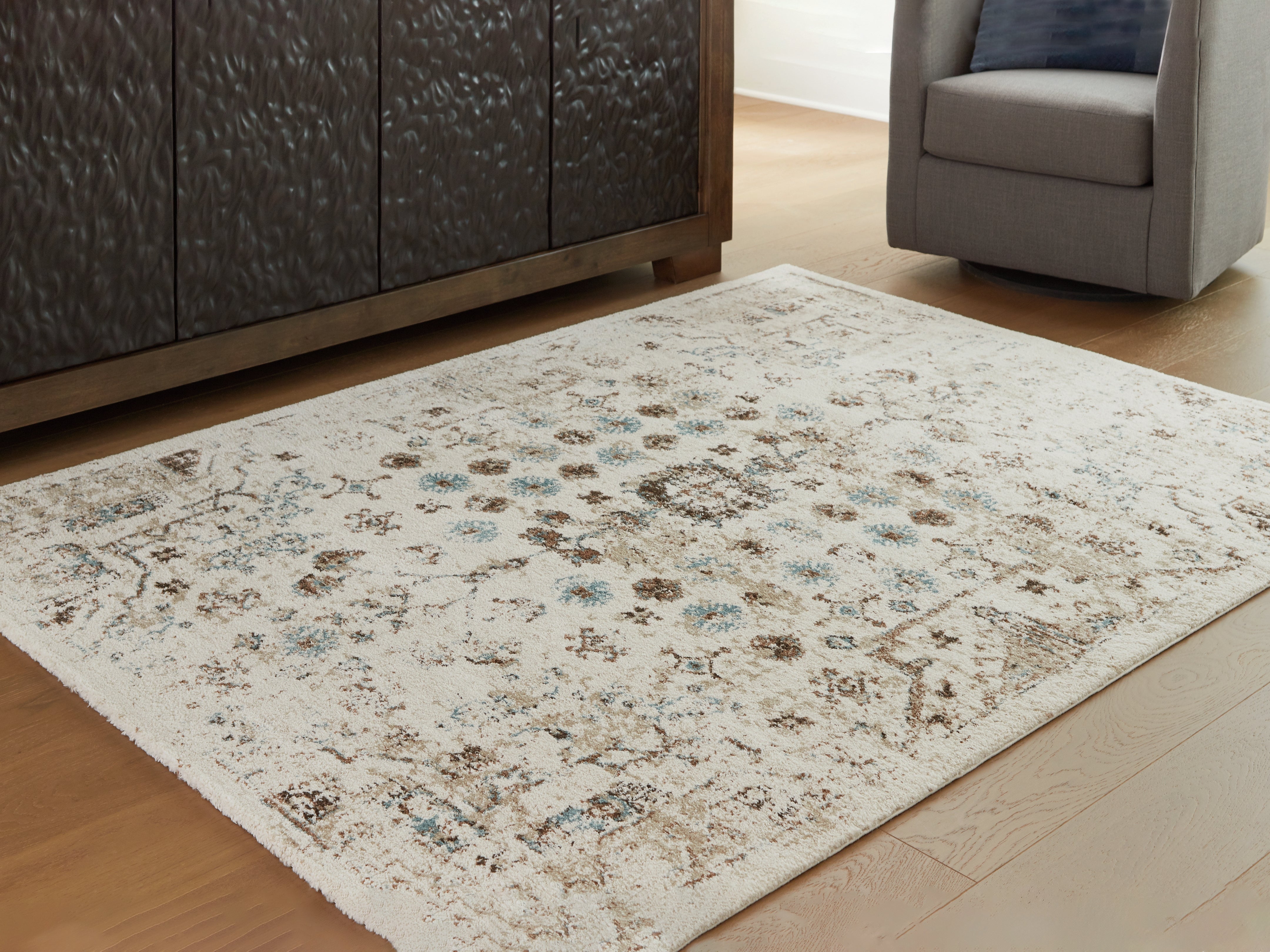 Luxury Living Gallery - Ashley Furniture - Jossler Rug - 8' x 10' Rug / Ivory/Brown/Teal - R407071