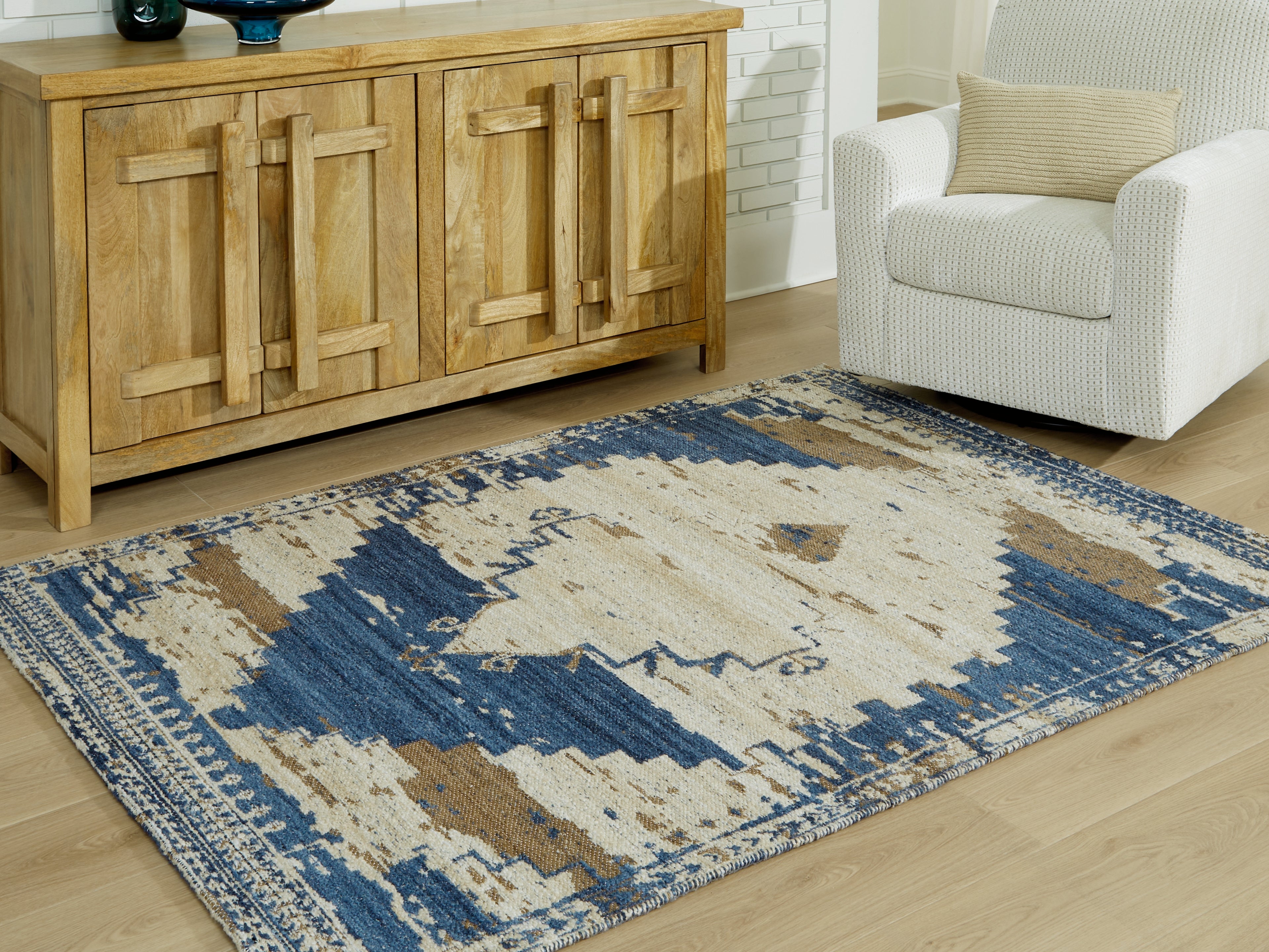 Luxury Living Gallery - Ashley Furniture - Varnler Rug - 5' x 7' Rug / Blue/Brown/Tan - R407132
