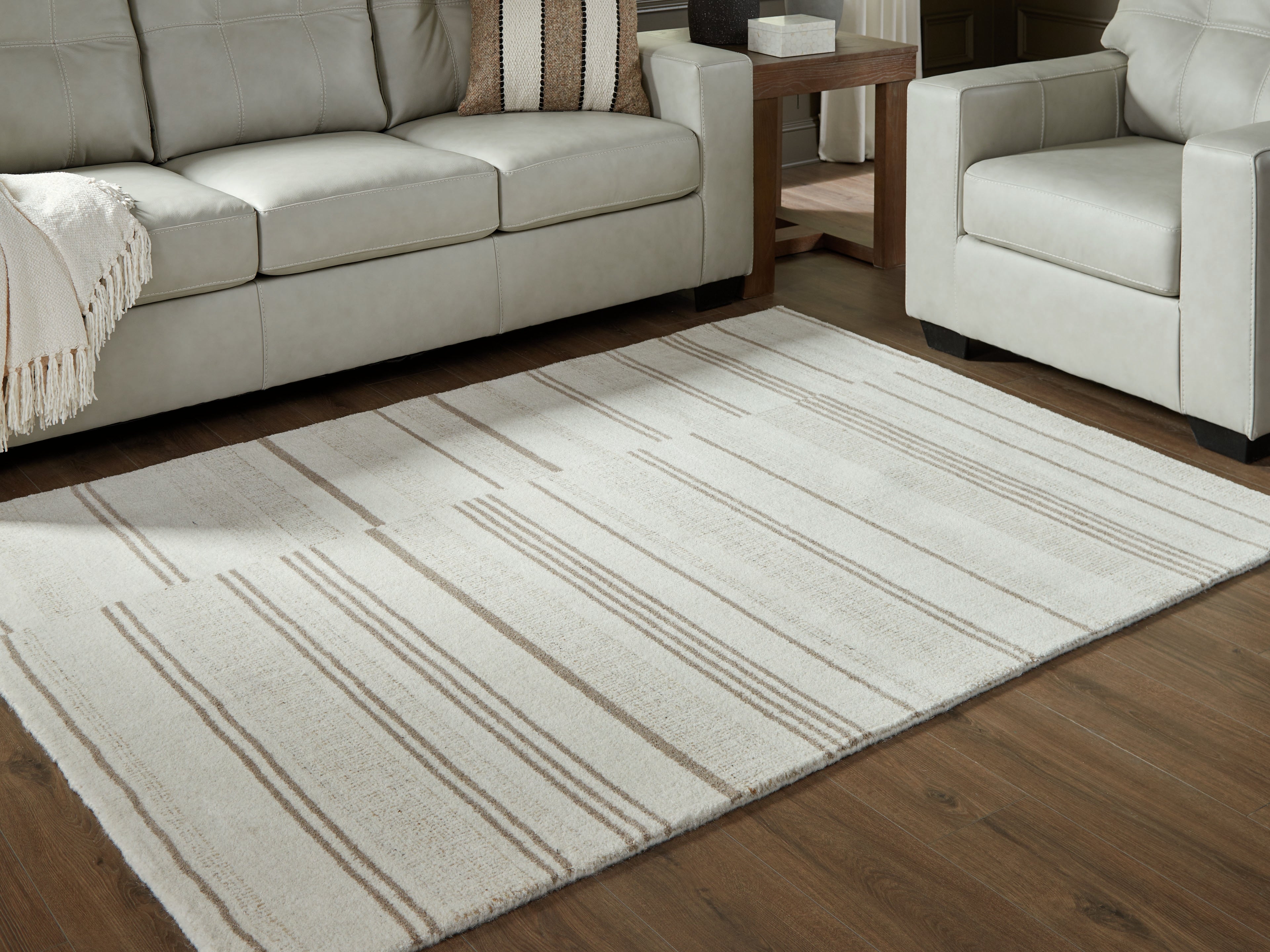 Luxury Living Gallery - Ashley Furniture - Gadence Rug - 5' x 7' Area Rug / Ivory/Tan - R407642