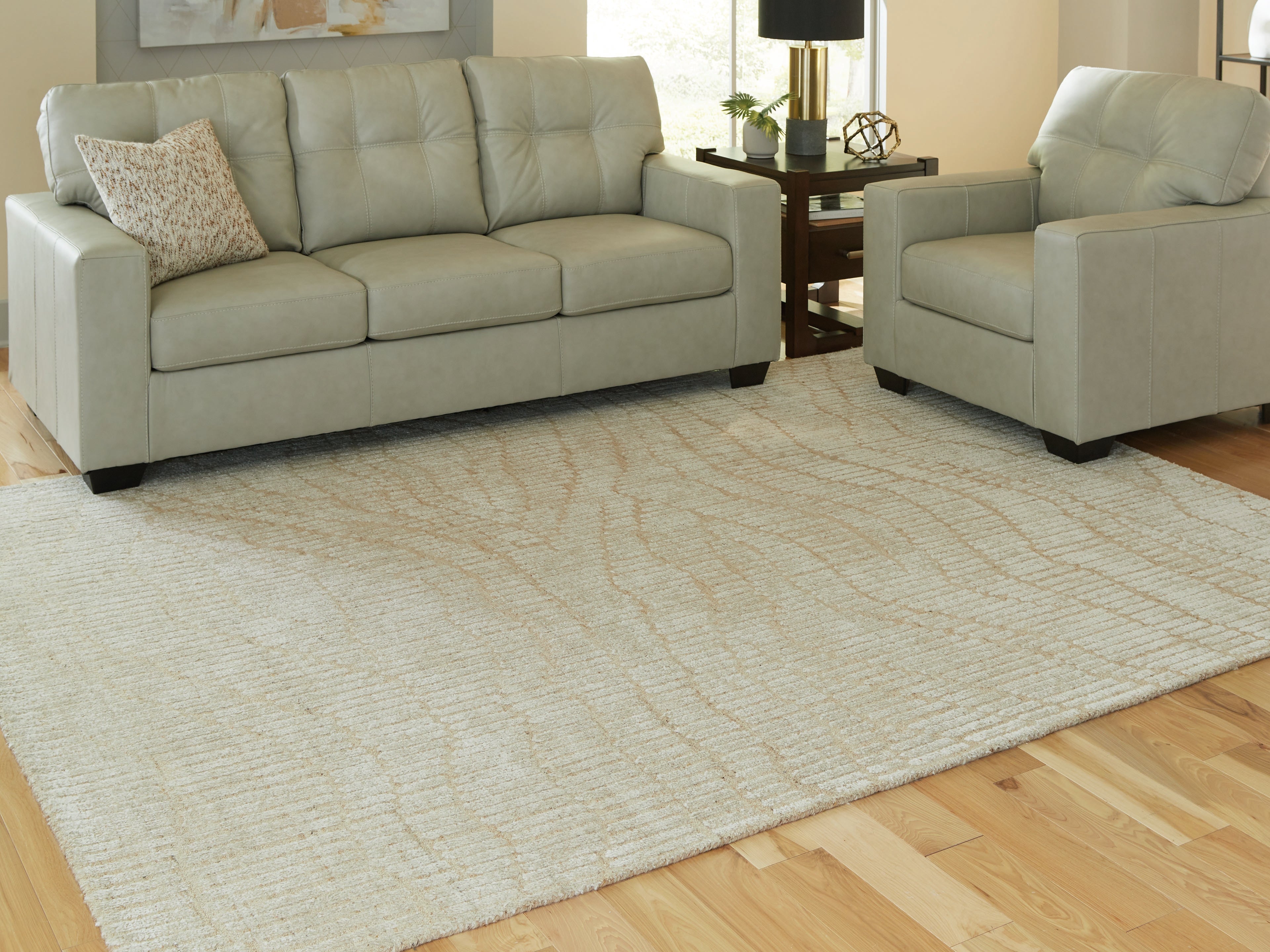 Luxury Living Gallery - Ashley Furniture - Jaseena Rug - 7'8" x 10' Area Rug / Beige/Tan - R407721