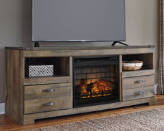 Luxury Living Gallery - Ashley Furniture - Trinell 63" TV Stand with Electric Fireplace - 63" TV Stand with Electric Fireplace / Brown - W446W9